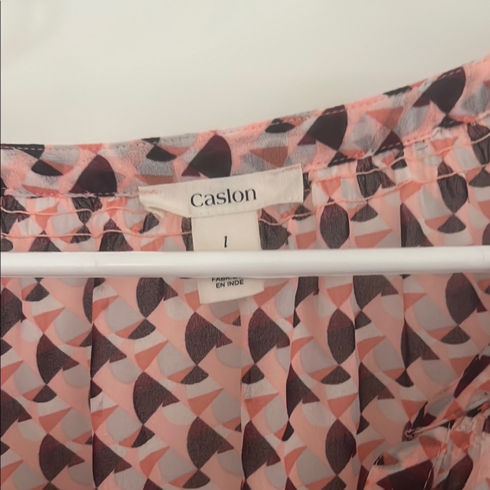 Caslon Geometric Pink/peach and purple Blouse on a cream background